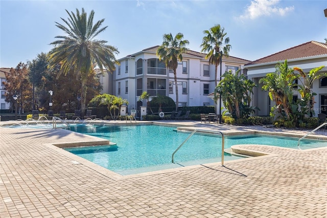 view of pool featuring a patio area