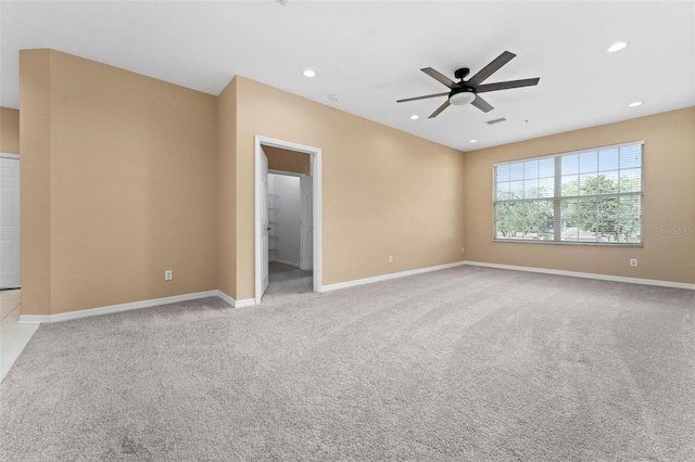 carpeted empty room with ceiling fan