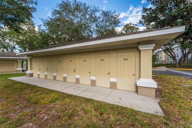 garage with a yard