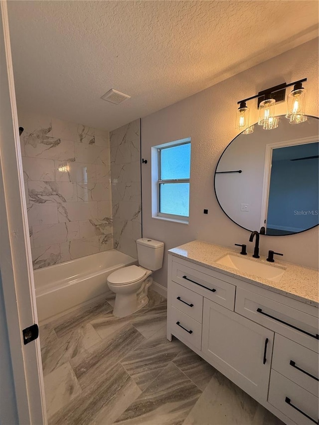 bathroom with a textured ceiling, toilet, visible vents, vanity, and  shower combination