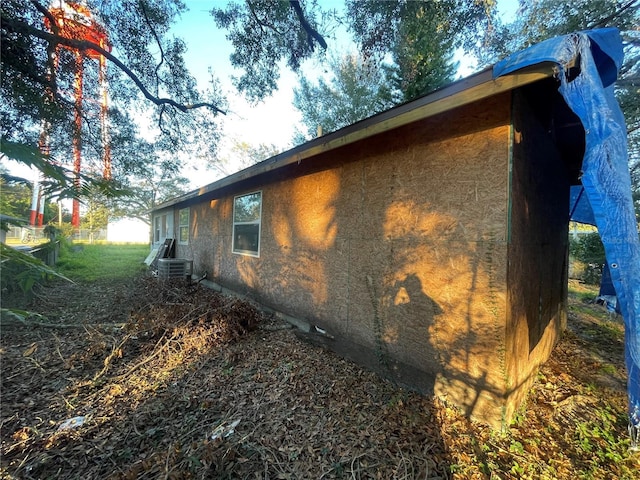 view of home's exterior with cooling unit