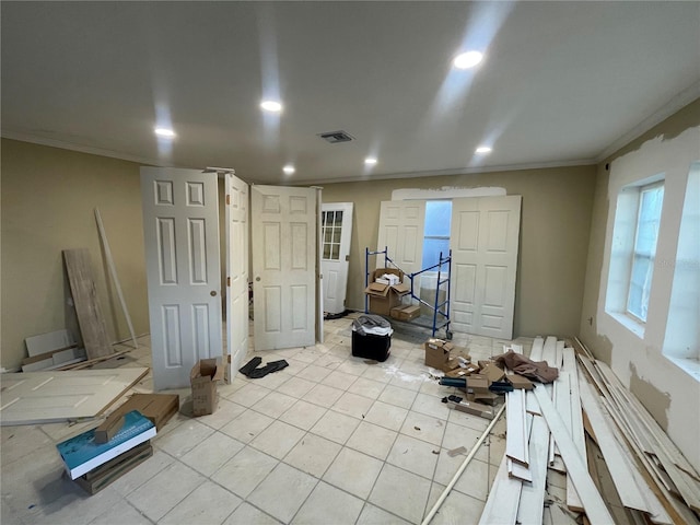 miscellaneous room featuring crown molding