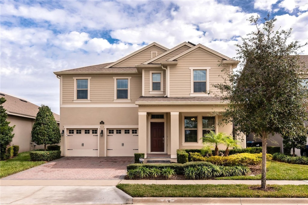 craftsman inspired home with a garage