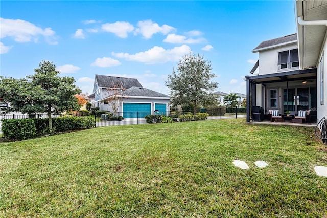 view of yard featuring outdoor lounge area and fence