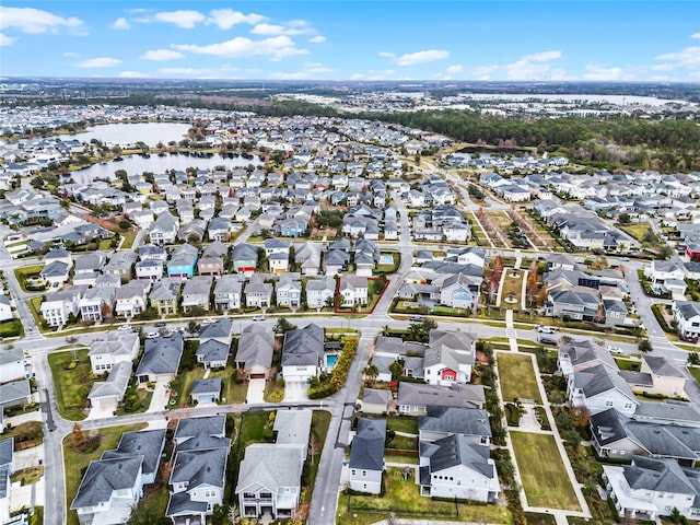 aerial view with a residential view and a water view