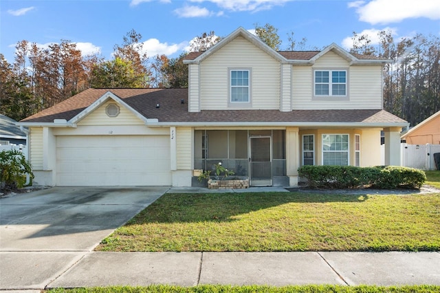 front facade with a front yard and a garage