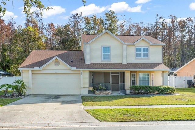 front of property featuring a garage and a front lawn