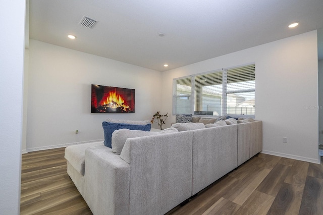 living room with dark wood-type flooring