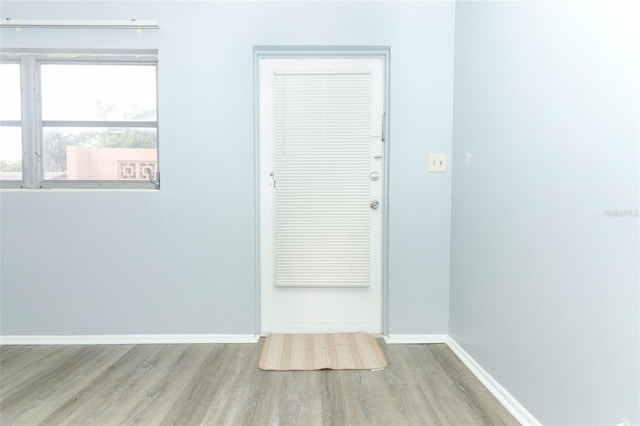 doorway to outside featuring light hardwood / wood-style flooring