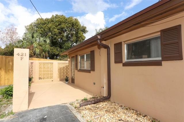 view of property exterior featuring a patio