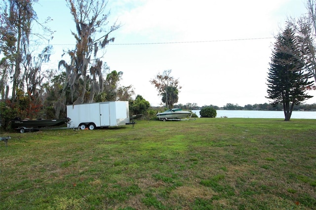 view of yard with a water view