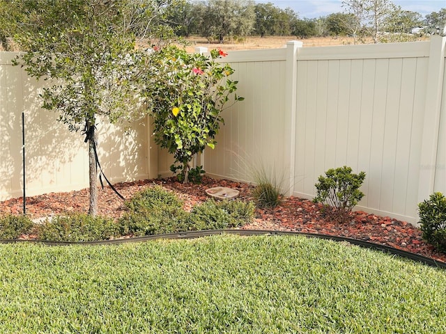 view of yard featuring fence