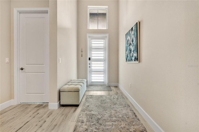 entryway with light hardwood / wood-style flooring