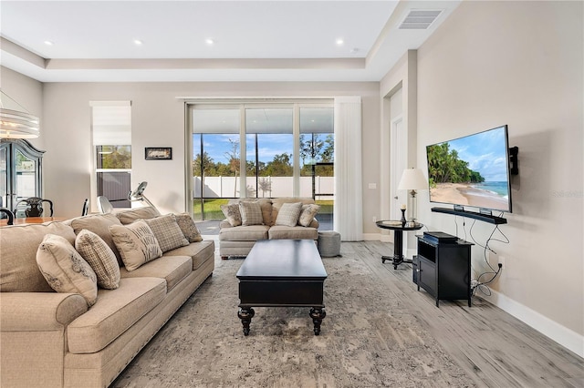 living room with light hardwood / wood-style flooring