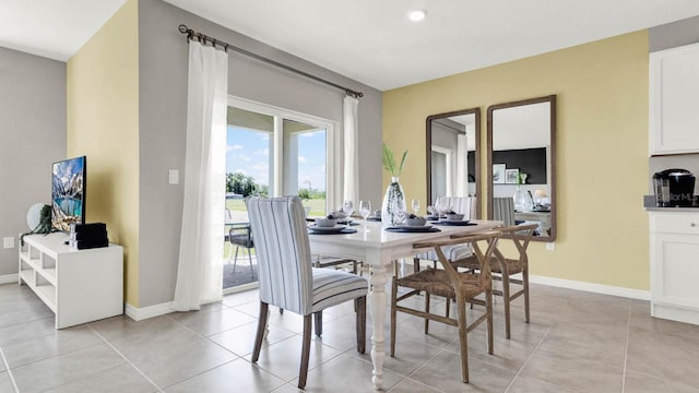 dining area with light tile patterned floors