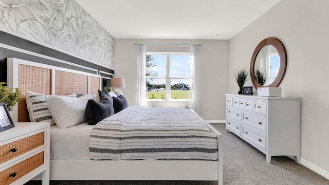 bedroom with light colored carpet