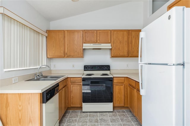 kitchen featuring under cabinet range hood, a sink, white appliances, light countertops, and vaulted ceiling