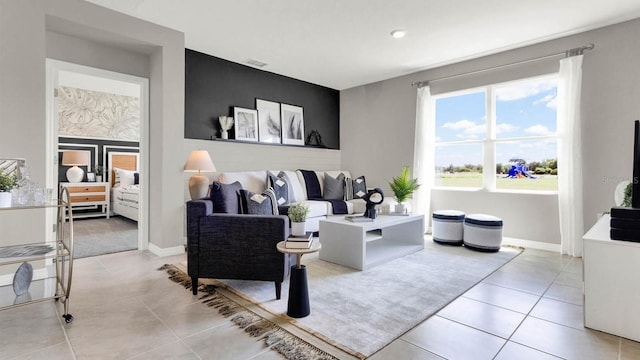 living room featuring light tile patterned flooring