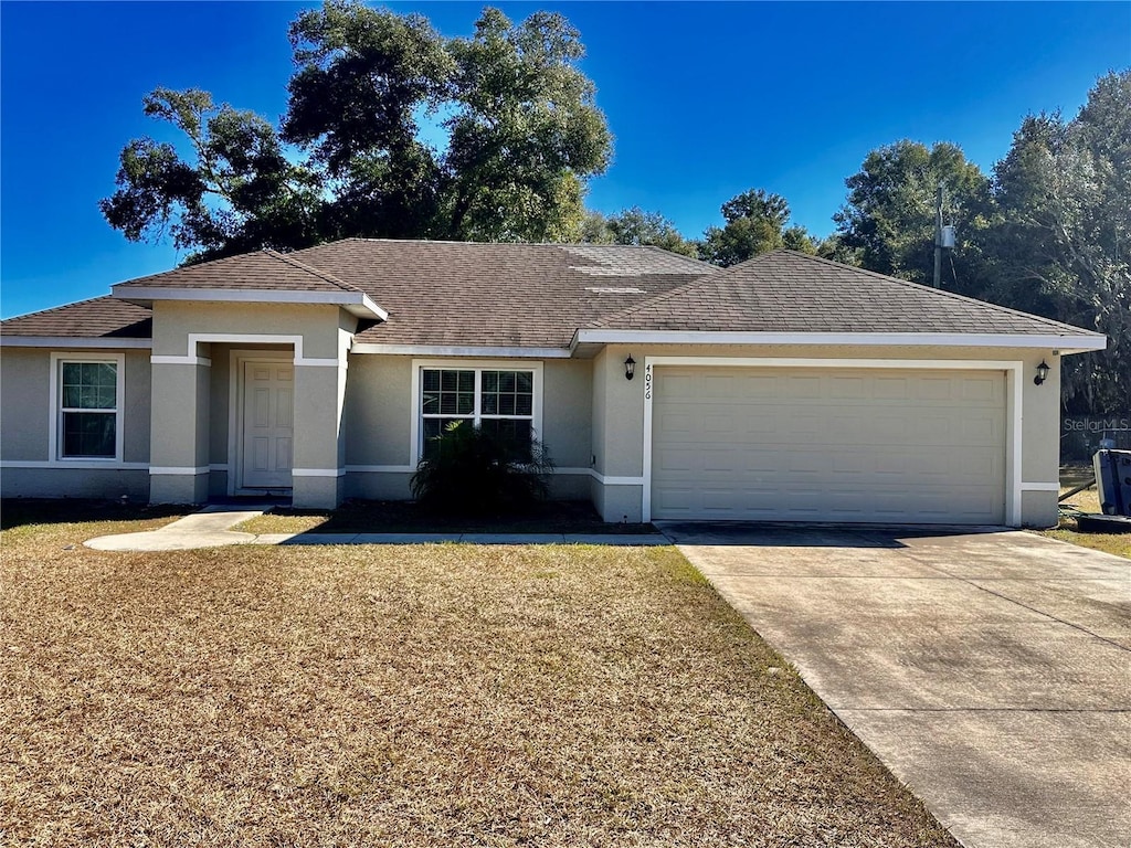 ranch-style house with a garage