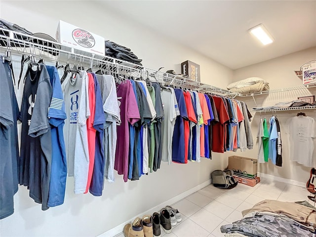 walk in closet featuring tile patterned floors