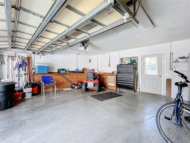 garage featuring a garage door opener