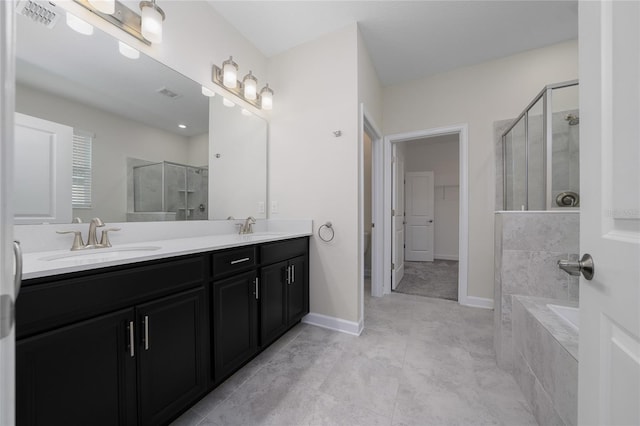 full bathroom with separate shower and tub, tile patterned floors, vanity, and toilet