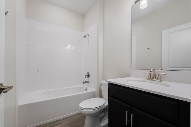 full bathroom featuring vanity, shower / bathtub combination, toilet, and wood-type flooring