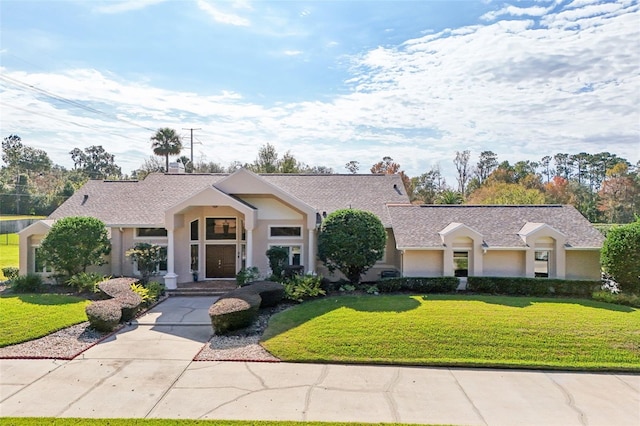 ranch-style house with a front yard