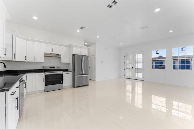 kitchen featuring sink, white cabinetry, and stainless steel appliances