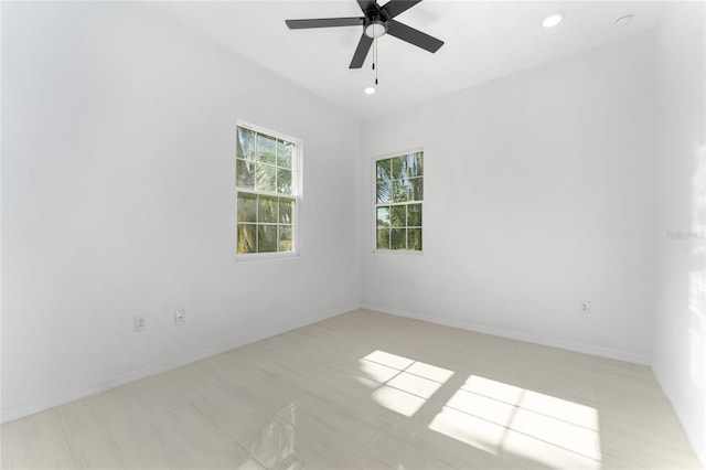 spare room featuring ceiling fan