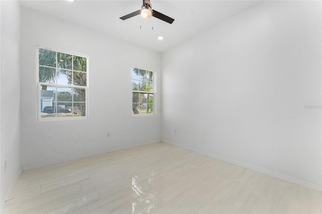 spare room featuring ceiling fan