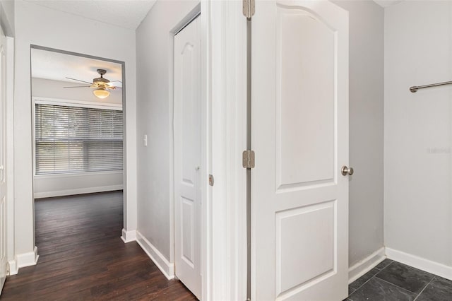 corridor with a textured ceiling