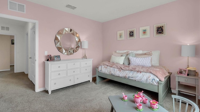 bedroom with light carpet