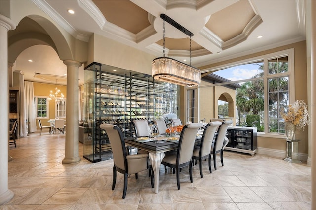 dining space featuring coffered ceiling, crown molding, a chandelier, beamed ceiling, and decorative columns