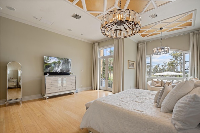 bedroom with wood-type flooring, access to outside, an inviting chandelier, and ornamental molding