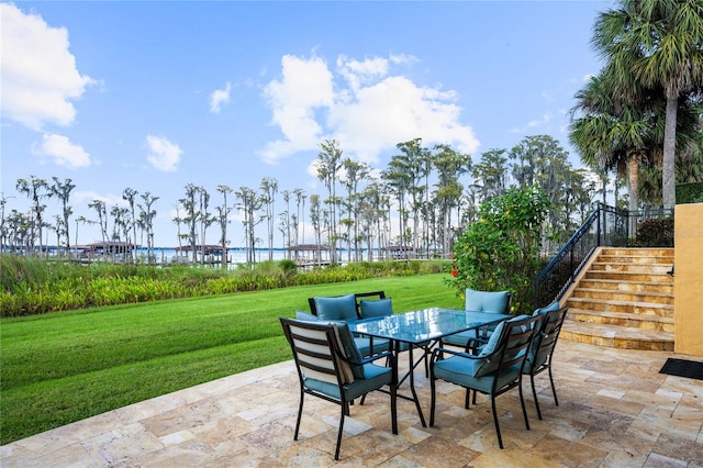 view of patio / terrace with a water view