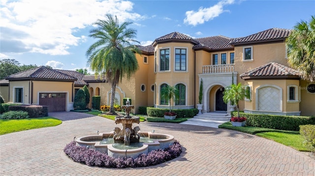 mediterranean / spanish-style house featuring a balcony