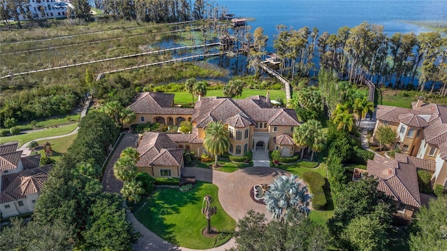 birds eye view of property featuring a water view