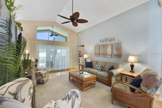 living room featuring ceiling fan and high vaulted ceiling