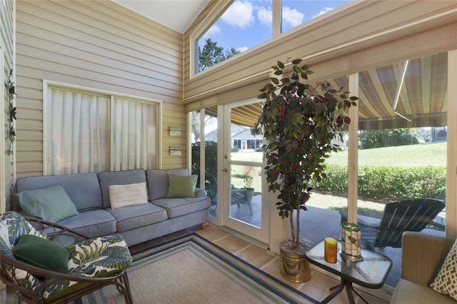 sunroom / solarium with lofted ceiling