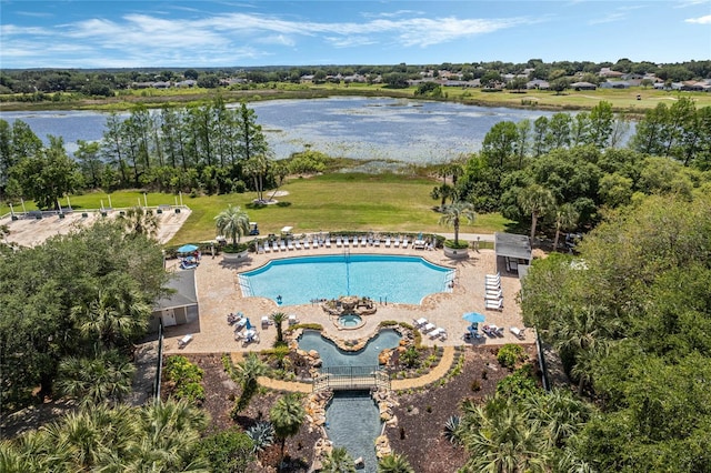 view of pool with a water view