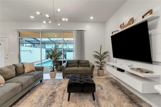 living room with a notable chandelier