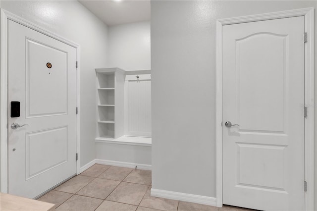 mudroom with light tile patterned floors