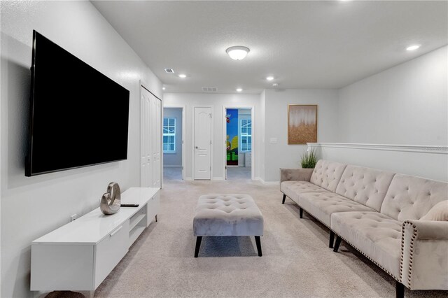 7424 Oakmoss Loop, Davenport, FL 33837 - living area featuring recessed lighting and light carpet