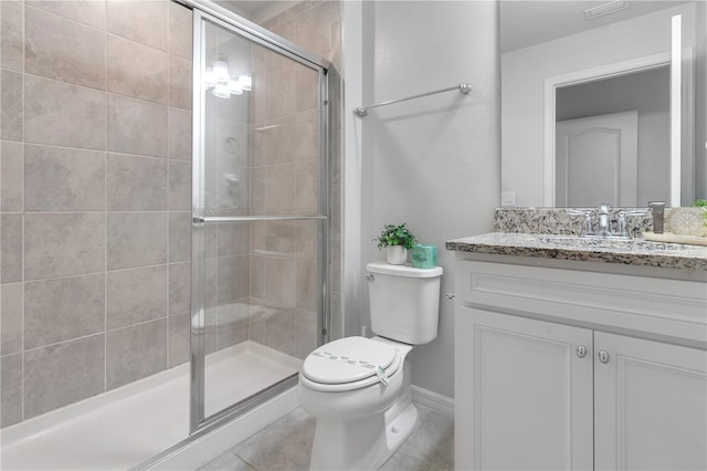 7424 Oakmoss Loop, Davenport, FL 33837 - bathroom featuring vanity, a stall shower, and tile patterned flooring