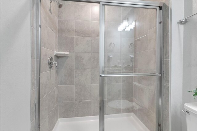 7424 Oakmoss Loop, Davenport, FL 33837 - full bath featuring a shower stall