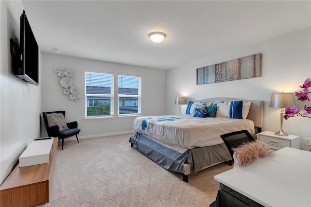 7424 Oakmoss Loop, Davenport, FL 33837 - bedroom featuring baseboards and light carpet