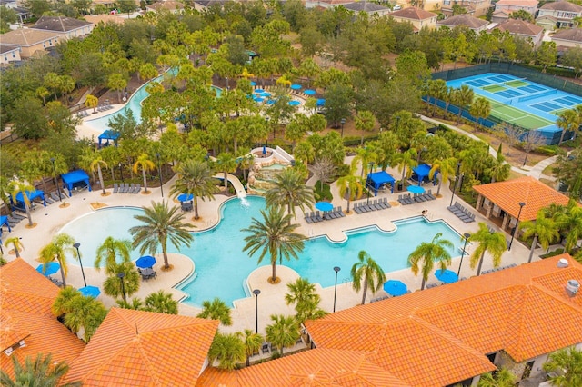 7424 Oakmoss Loop, Davenport, FL 33837 - community pool featuring a patio