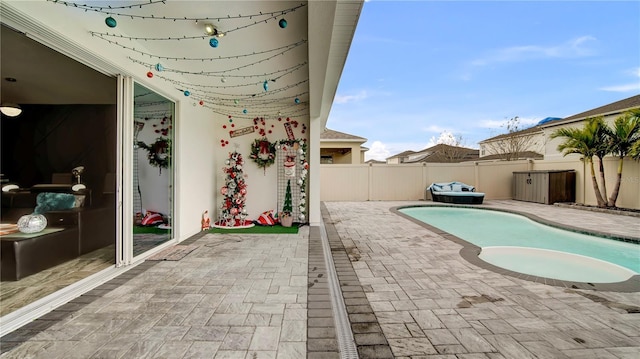 view of pool featuring a patio area