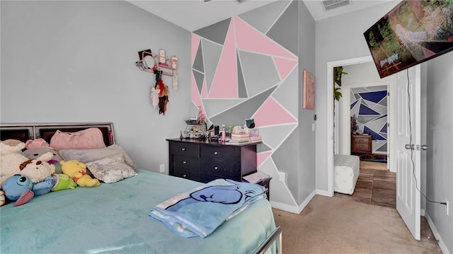 bedroom with light colored carpet